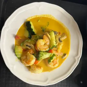 40. Gele curry met garnalen