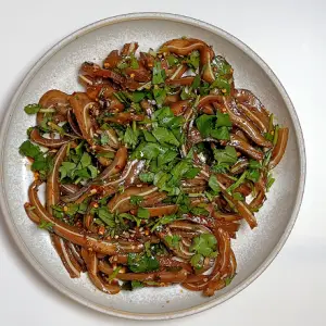 Fried pig ears with coriander, sesame sauce & chili / 卤猪耳配香菜、芝麻酱和辣椒